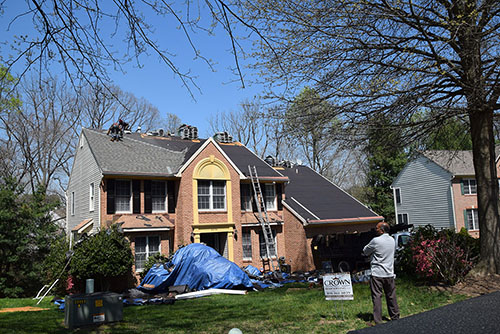 roof replacement job in progress